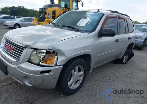 2006 GMC Envoy Sle z USA, uszkodzony, nr VIN 1GKDT13S762116213